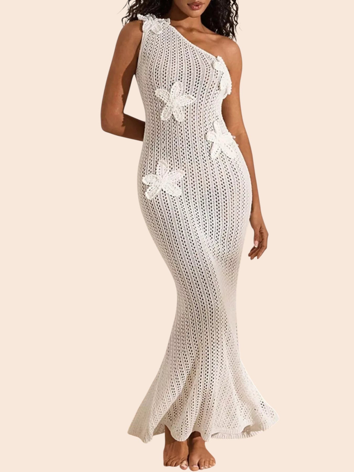 My Store white one-shoulder crochet maxi dress featuring dimensional floral appliqués and a flared hem on a model.