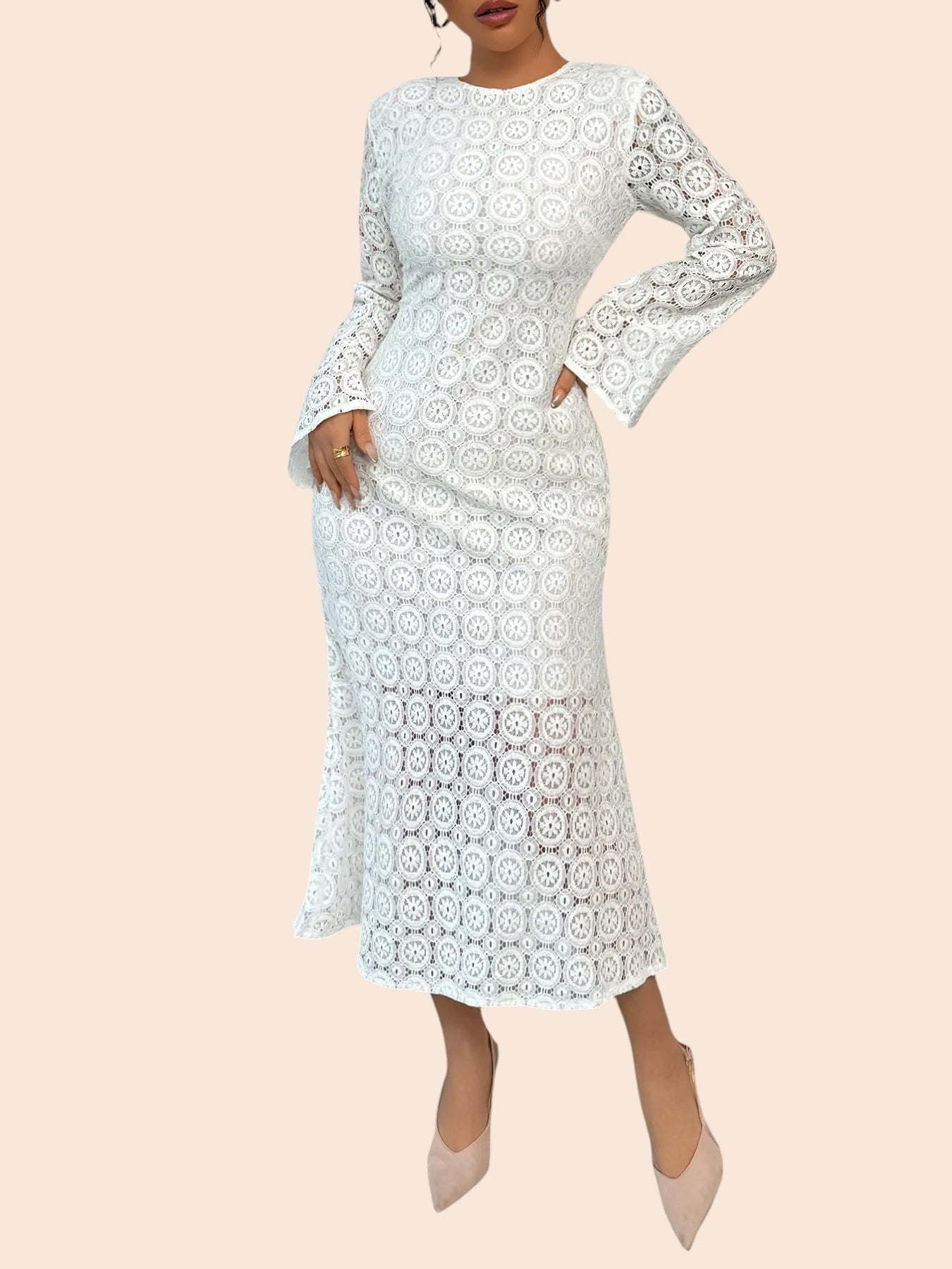 My Store white floral lace midi dress with long sleeves and a flared hem worn by a model in a bright room.