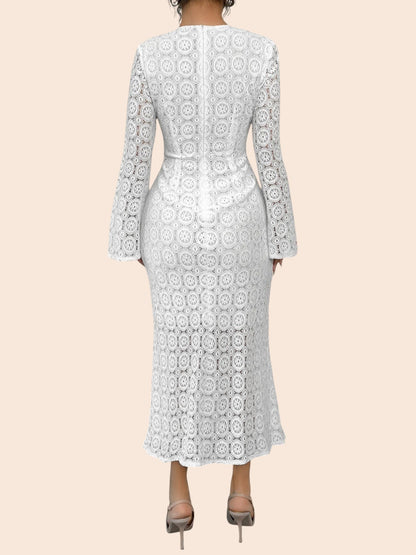Back view of a My Store white floral lace long sleeve midi dress with a curve-skimming fit and back zipper closure.