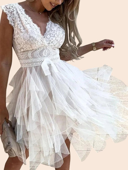 My Store white mini dress featuring an intricate lace bodice, V-neckline, and a voluminous layered tulle skirt.