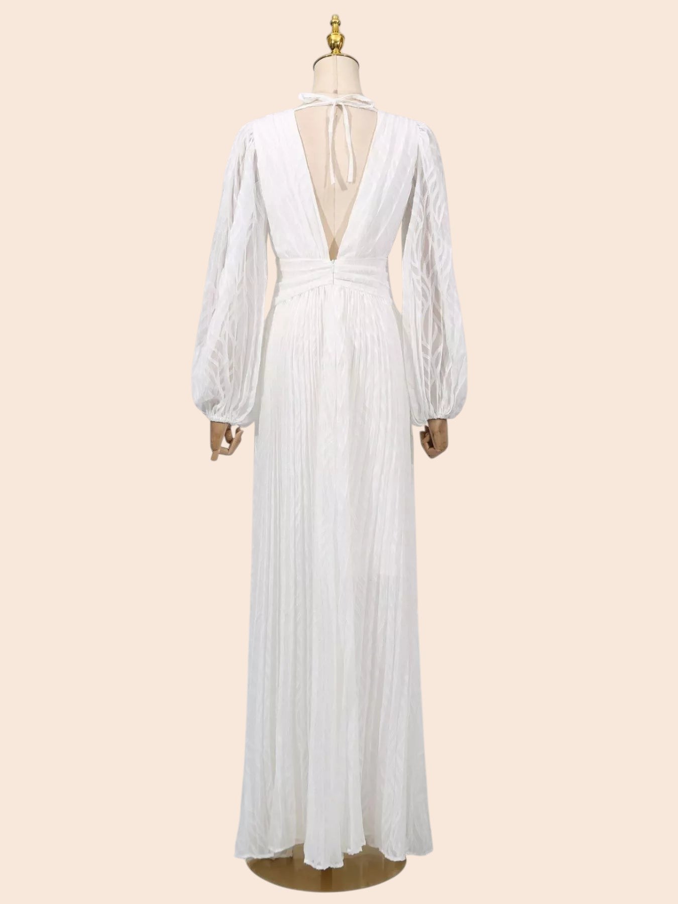 Back view of My Store white maxi dress with leaf texture, deep V-neck, tie closure, and voluminous balloon sleeves.