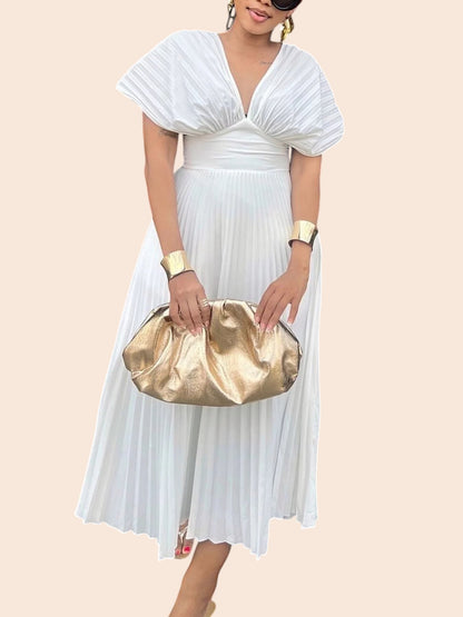 My Store white pleated midi dress with V-neck, cap sleeves, and fitted waistband, styled with a gold clutch.