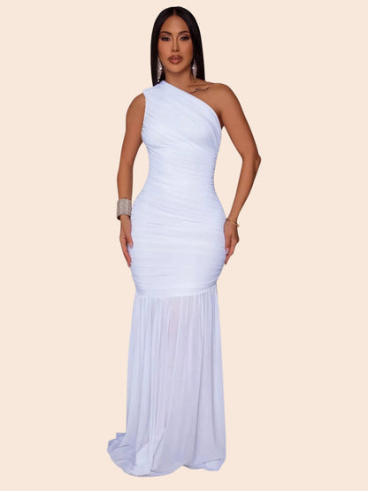 Model wearing a My Store white one-shoulder ruched mermaid maxi dress with a fitted bodice and floor-length skirt.