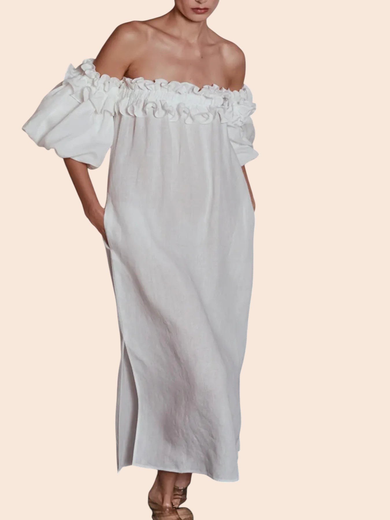 My Store white off-shoulder maxi dress with ruffled neckline, voluminous sleeves, and side slit on a model