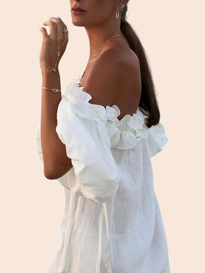 My Store white off-shoulder maxi dress with ruffled neckline and voluminous sleeves on a model