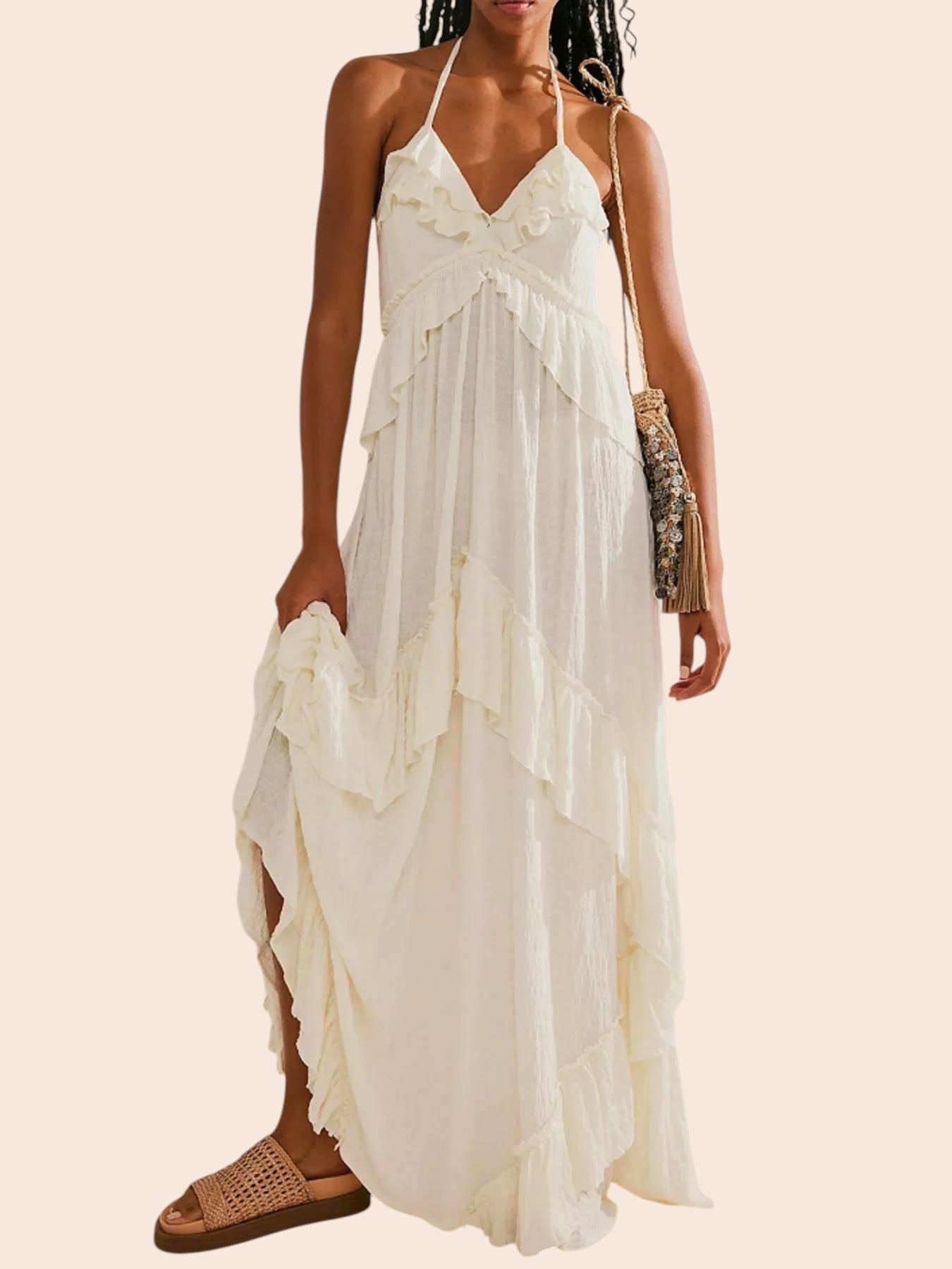 My Store white ruffled tiered halter maxi dress with an open back worn by a model with woven sandals