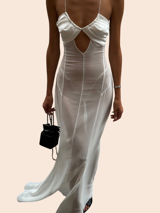 My Store white sheer maxi dress with a sculpted ruched bust, front cutout, and slim halter straps on a model.
