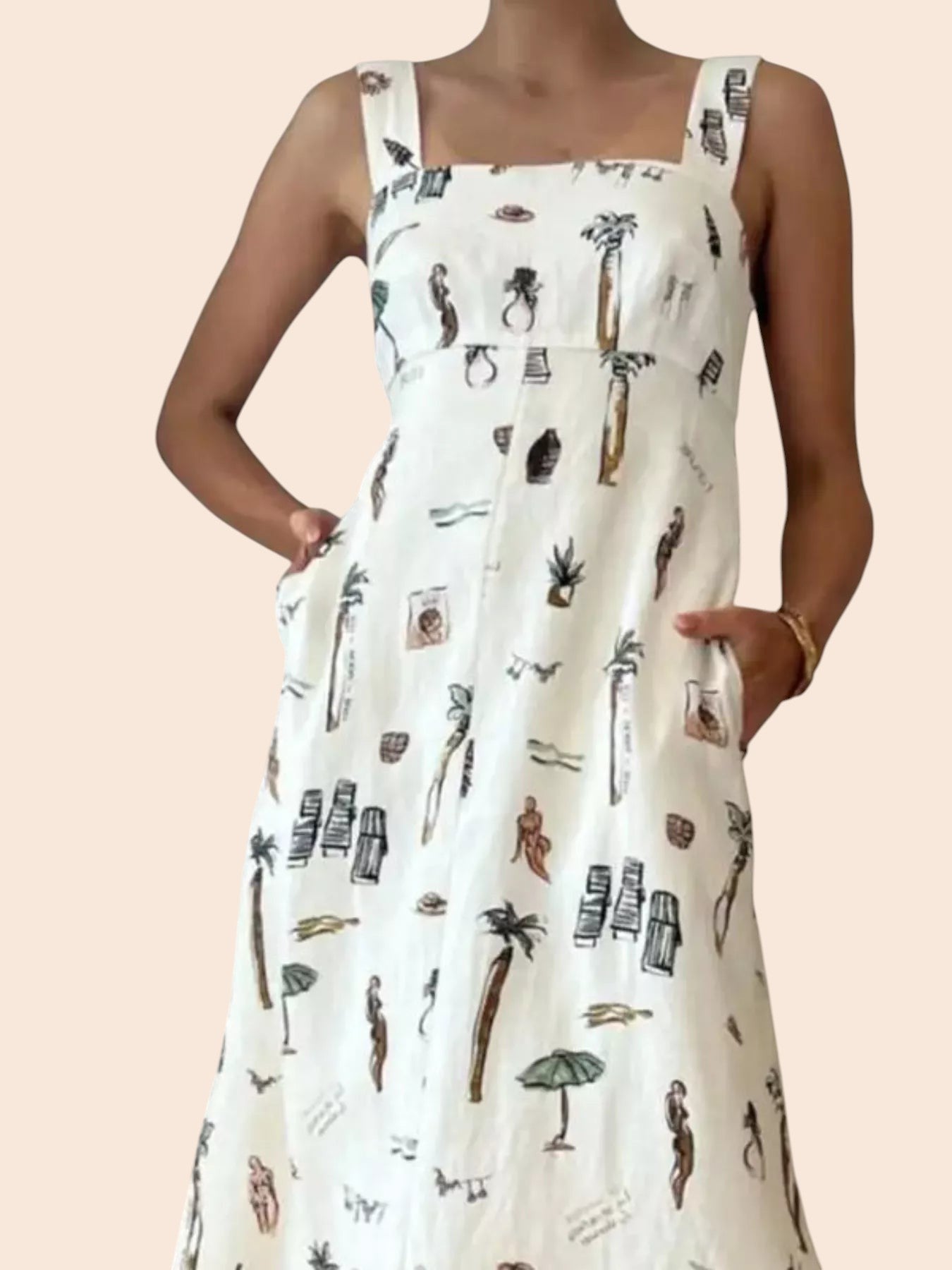 My Store sleeveless white maxi dress with a whimsical tropical print, featuring side pockets and a relaxed fit.