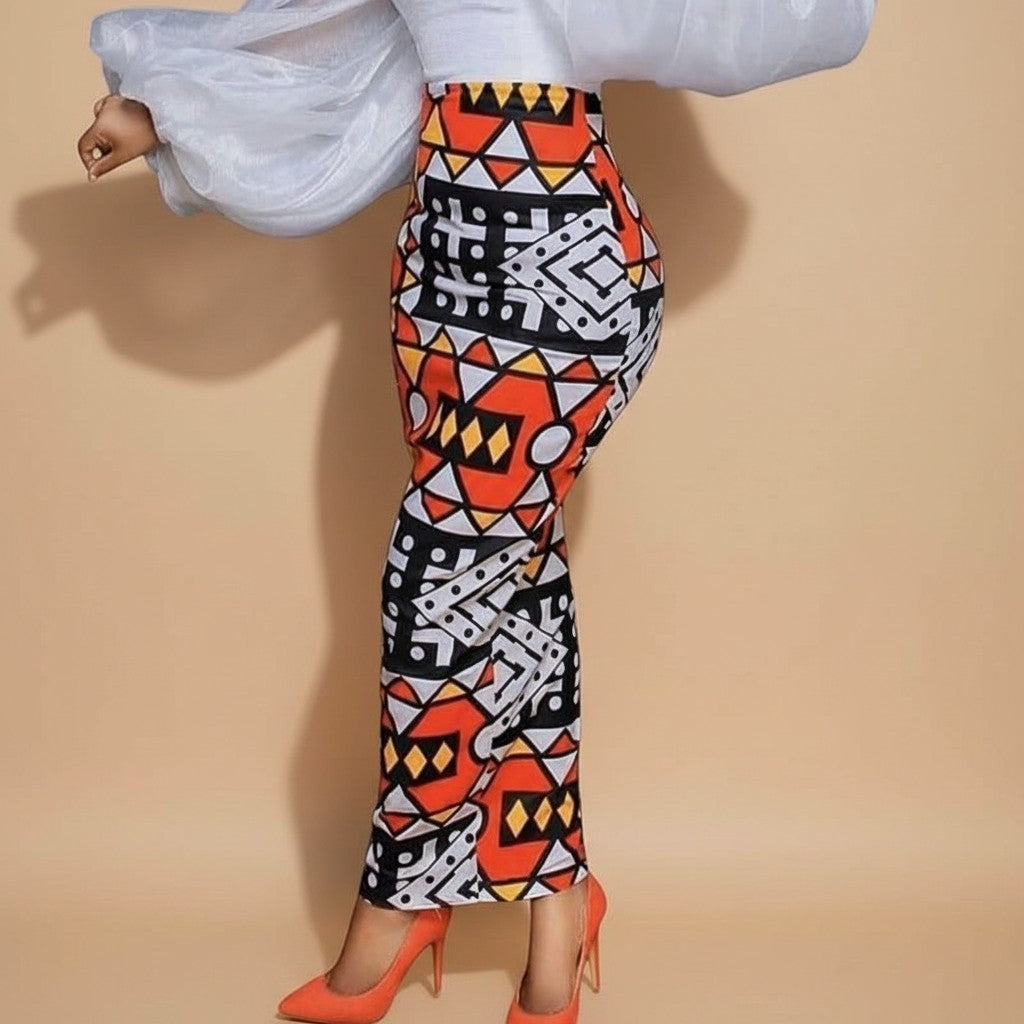 My Store Geometric High-Waist Bodycon Maxi Skirt in orange, white, black, and yellow abstract print. Stretchy fabric.
